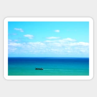 Heavenly view of the Adriatic Sea in Ortona with intensifying color and a boat Sticker